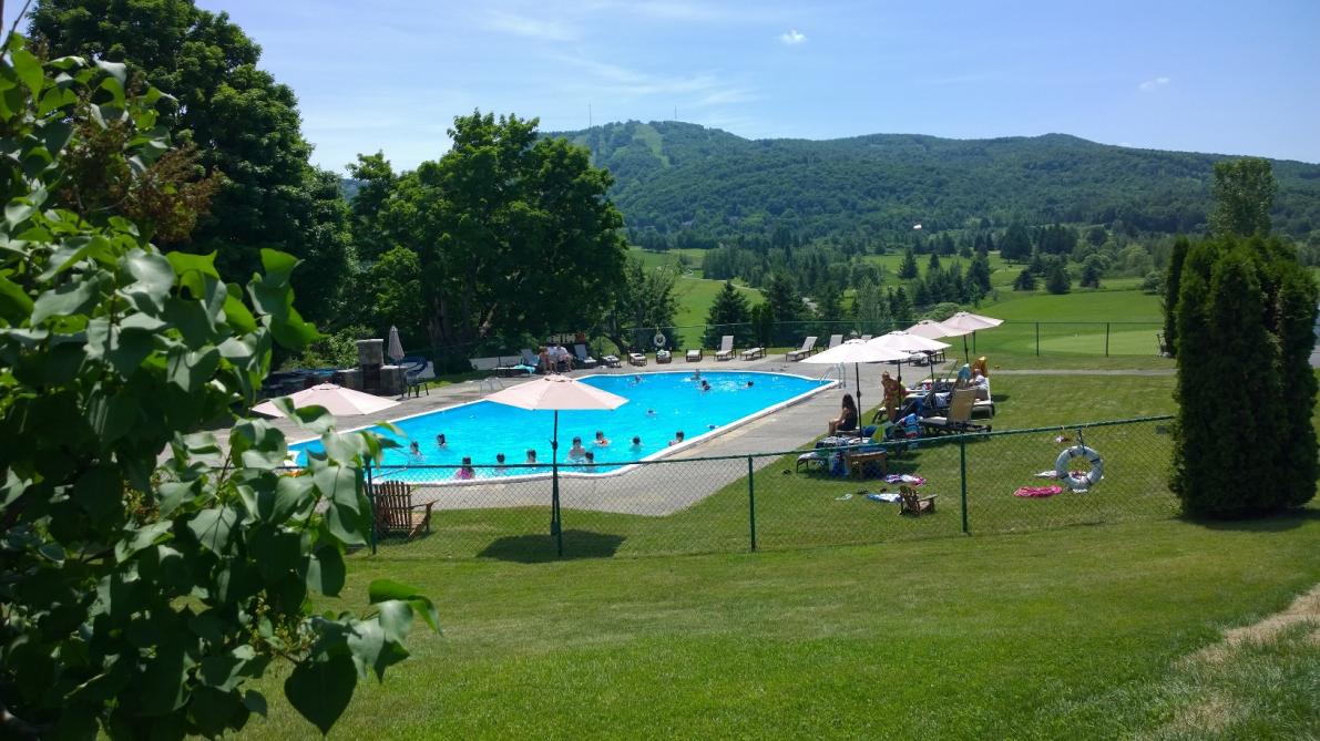 At the base of mountain : A view of the mountain from Auberge Château-Bromont and golf