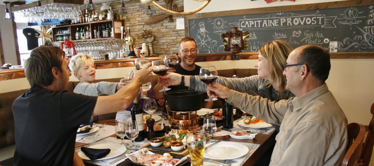 Fondue dinner beside the fireplace:
