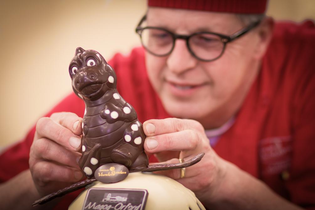 Creation: The artisan is finishing a special chocolate, Memphré our lake Memphrémagog monster.