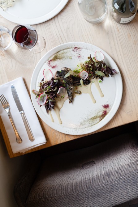 Grilled sardines: Grilled sardines, Romaine lettuce, lemon, daisy buds and anchovy sauce