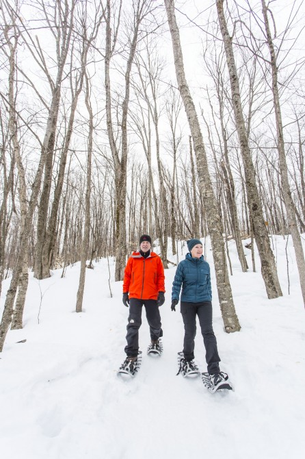 Snowshoeing: Retired couple snowshoeing