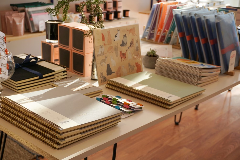 Selection of locally made stationery.: We offer notebooks, posters, office accessories, pens, all made locally.